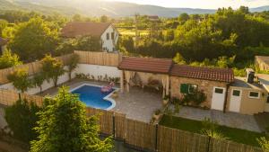 an aerial view of a house with a swimming pool at Villa Bella in Mostar