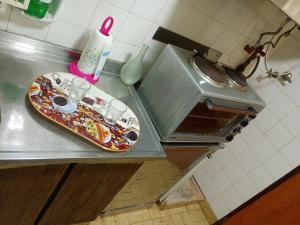 a tray of food on a counter in a kitchen at Lindo recuerdos in Posadas +1 photo