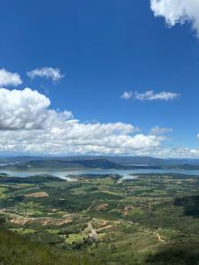 an aerial view of a large body of water at Apartamento Tranquilo e Aconchegante in Carmo do Rio Claro