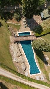 an overhead view of a swimming pool in a yard at Castello Di Tornano Wine Relais in Gaiole in Chianti