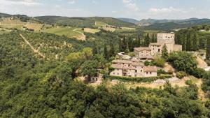 an aerial view of an estate in the hills at Castello Di Tornano Wine Relais in Gaiole in Chianti