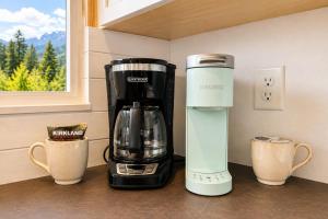a coffee maker sitting on a counter next to a window at Berg Haus Home in Leavenworth +45 photos