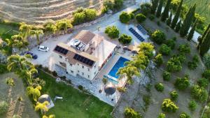 an aerial view of a house with a pool at Stephanie Villa in Simou