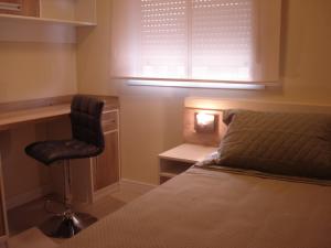 Postel nebo postele na pokoji v ubytování Apartamento Aeroporto