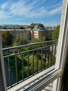 a balcony with a view of a building at Gori Palace in Gori
