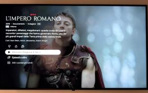 a person on a television screen with a website at CENTURIONI Alloggio turistico in Civitavecchia +33 photos