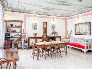 a living room with a table and a couch at Holiday Home Il Cavaliere by Interhome in Castellero