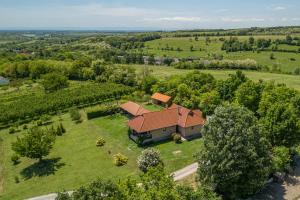 an overhead view of a house in a field at Panoráma Vendégház Bükkösd in Bükkösd