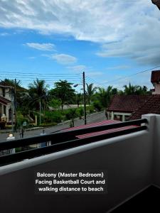 a view of a city street from a balcony at Osvy Palm Homestay in Penampang