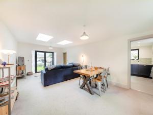 a living room with a table and a couch at Number 29 in Alnwick