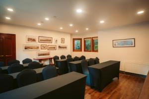 a conference room with chairs and a table in it at Casa Molino Hotel Boutique & Restaurant Puerto Varas in Puerto Varas