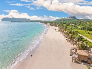 an aerial view of a beach with chairs and the ocean at Serenity at Coconut Bay All Inclusive - Couples Only in Vieux Fort