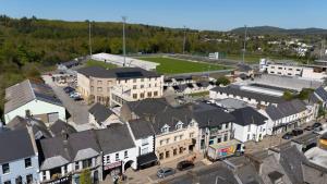 an aerial view of a town with buildings at The Villa Rose Hotel & V-Spa in Ballybofey