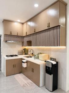 a kitchen with a sink and a counter top at DOS Unica Hija Hometel by TahZora in Valencia +48 photos