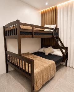 a bedroom with two bunk beds in a room at DOS Unica Hija Hometel by TahZora in Valencia