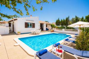 an image of a villa with a swimming pool at Villa Ca Nostra in Cala en Porter
