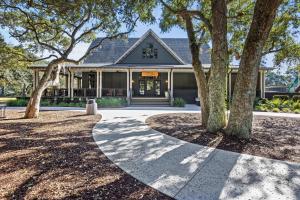a house with trees in front of it at GA181: 181 Glen Abbey in Kiawah Island