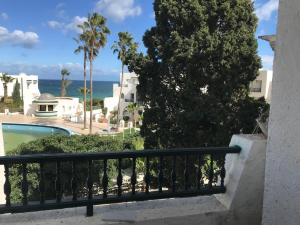 a balcony with a view of the ocean at Vue superbe in Port El Kantaoui