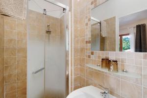 a bathroom with a shower and a sink at Gite Mare e Monti in Vico +32 photos