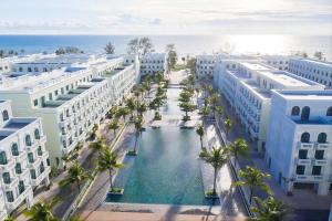 an aerial view of a resort with a swimming pool at Viona Beach Hotel - Marina Phu Quoc in Phú Quốc