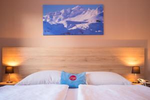 Posteľ alebo postele v izbe v ubytovaní Hotel Mosermandl