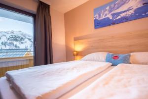 Posteľ alebo postele v izbe v ubytovaní Hotel Mosermandl