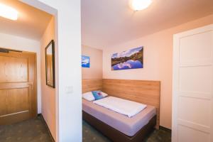Posteľ alebo postele v izbe v ubytovaní Hotel Mosermandl