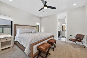 a bedroom with a bed and a ceiling fan at 238 Night Hawk Home in Granby