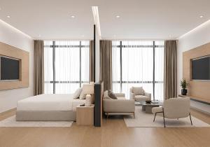 a bedroom with a bed and a living room at NOMAD Luxe Hotel in Zharkent