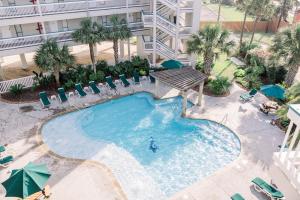 an overhead view of a swimming pool at a hotel at Blue Pearl Beachfront Condo at Casa de Mar in Galveston