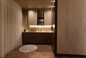 a bathroom with a sink and a mirror at Montéa Villa in Brezovica +5 photos
