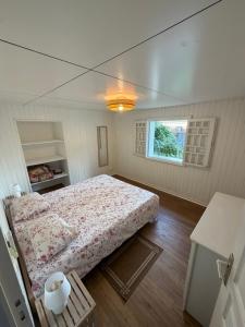 a bedroom with a bed and a window at Maison de Charme tout confort in Saint-André