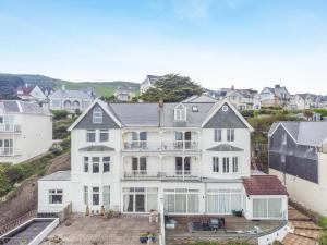 an aerial view of a large white house at 2 Bed in Woolacombe oc-shore1 in Woolacombe