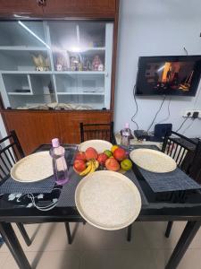 a table with fruit on top of it at Explore Inn T-Nagar in Chennai