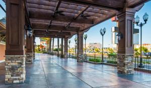 a covered walkway with columns and a fence at Tropicana Laughlin Hotel & Casino - A Caesars Rewards Destination in Laughlin +35 photos