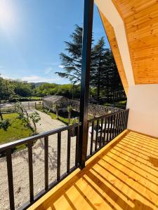 a view from the balcony of a house at Loreta's Canyon Farmhouse in Martvili