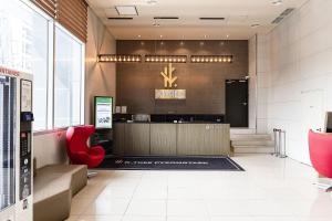 a waiting room with a krispy kreme sign on the wall at Hotel K-Tree Pyeongtaek in Pyeongtaek
