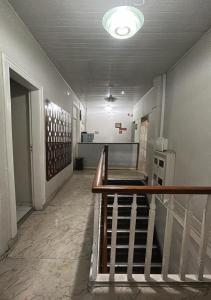 a hallway with a staircase in a building at Hotel Castro Alves, São Paulo in São Paulo