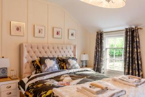 a bedroom with a large bed and a window at 1 Bed in Elstronwick oc-e42580 in Burton Pidsea