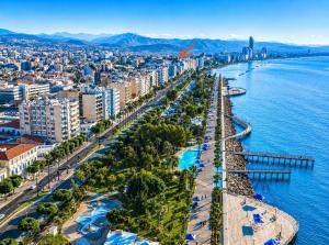 an aerial view of a city next to the water at Smart Comfort RoomN3 with Private Bathroom in best Location Beach 250m in Limassol