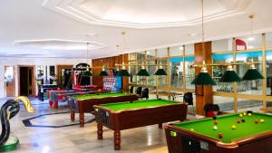 a billiard room with several pool tables at Benalbeach loft in Benalmádena