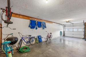 a garage with two bikes parked on the wall at The Gallery in Kitty Hawk
