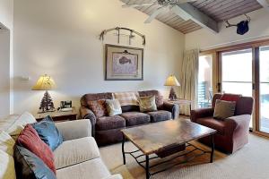 a living room with a couch and a table at Timberline Condominiums 1 Bedroom plus Loft Deluxe Unit D3B in Snowmass Village