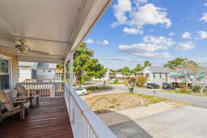 a view from the porch of a home at Sea Glass Shack in Kill Devil Hills