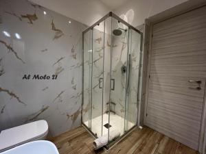 a shower in a bathroom with a toilet at Al molo 21 in La Spezia +68 photos