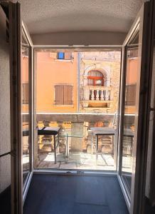 a view of a balcony from a window at EXCELSIOR Apartments Rovinj in Rovinj