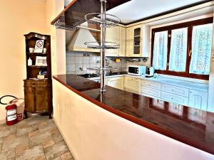 a kitchen with a counter top in a room at Villa La Terrazza in Porto Santo Stefano