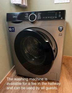 a washing machine is available for a fee in the hallway and can be used by at Moder Studio Nr15 in Limassol