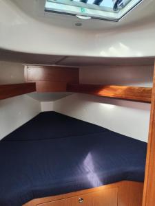 a view of the under cabin of a boat at Spend a night on a Sailing Boat in Saltvik