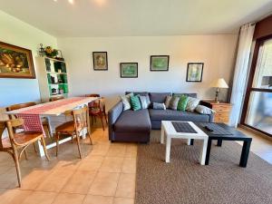 a living room with a couch and a table at La Cometa de Ajo -12016 in Ajo